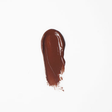 Chai Date caramel brown nude lipstick swatch on dusky Indian skin — Luxiora velvet matte