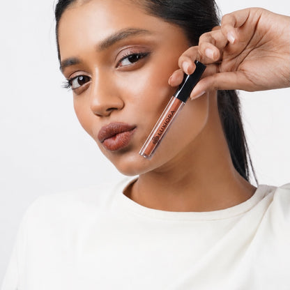 Chai Date caramel brown nude Medium skin Model wearing Luxiora hai Date caramel brown nude lipstick on Indian skin, velvet matte brown nude lipstick — solid and trending (the 90s brown-nude comeback)