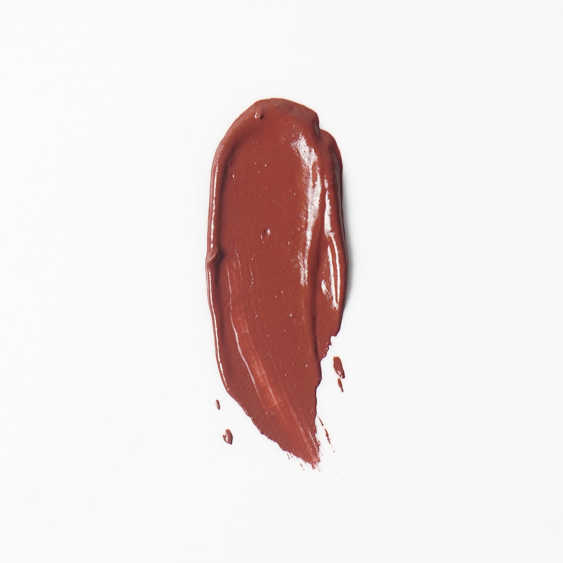 Masala Mood terracotta nude lipstick swatch on warm Indian skin — Luxiora velvet matte